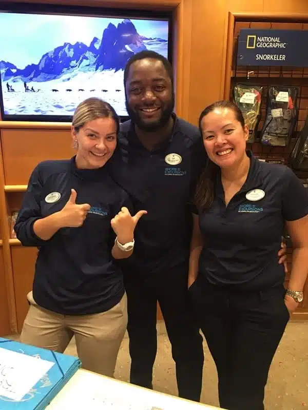 My lovely team and I at the Shore Excursions desk, Independence of the Seas, Royal Caribbean cruise ship