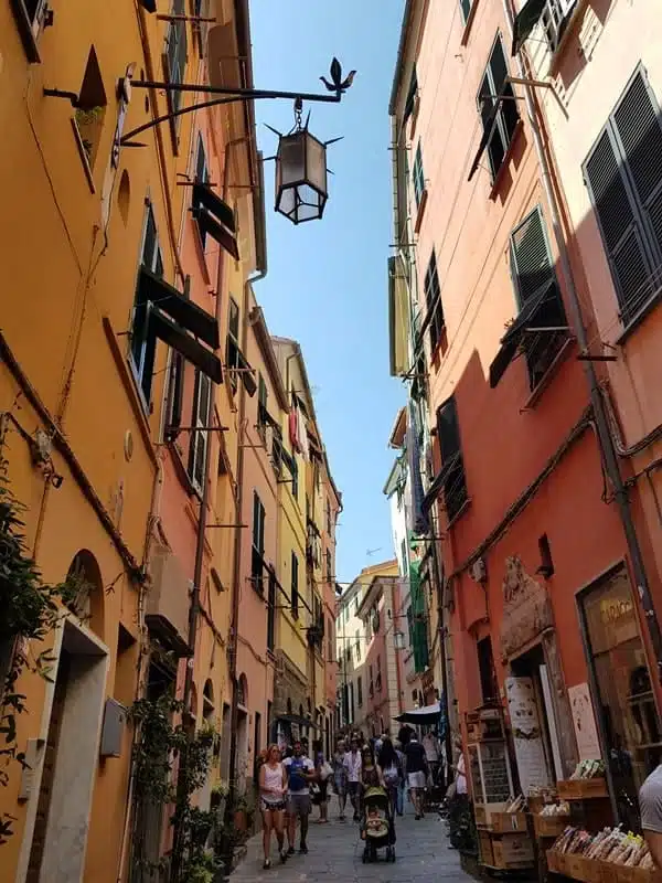 Colorful facades of tall buildings in Via Capellini, Portovenere