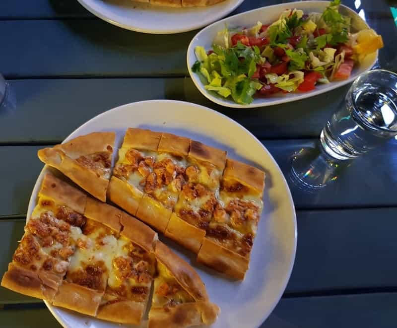 Typical Turkish dish - "pide", a type of pastry with chicken and cheese