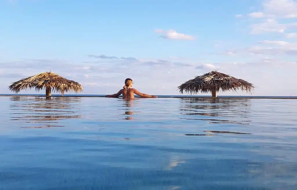 Taking a swim at a hotel resort in Freeport, the Bahamas