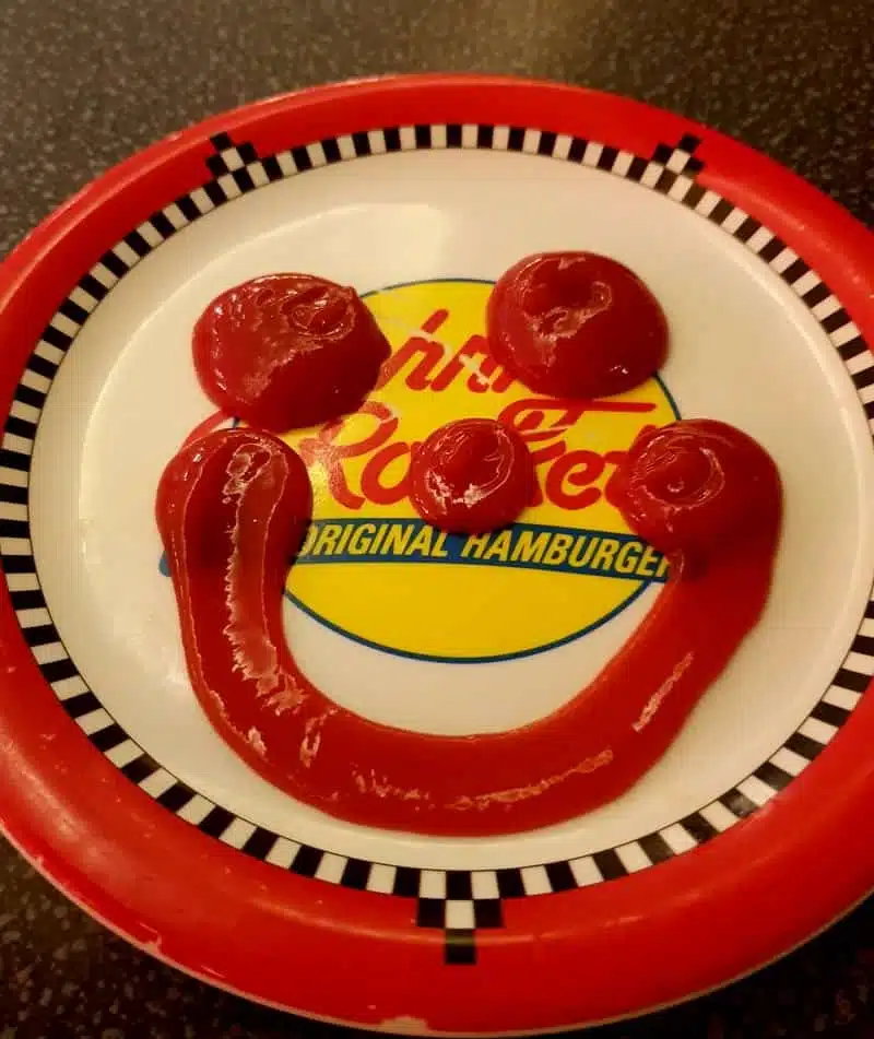 The plate in Johnny Rockets restaurant featuring smiley made of ketchup