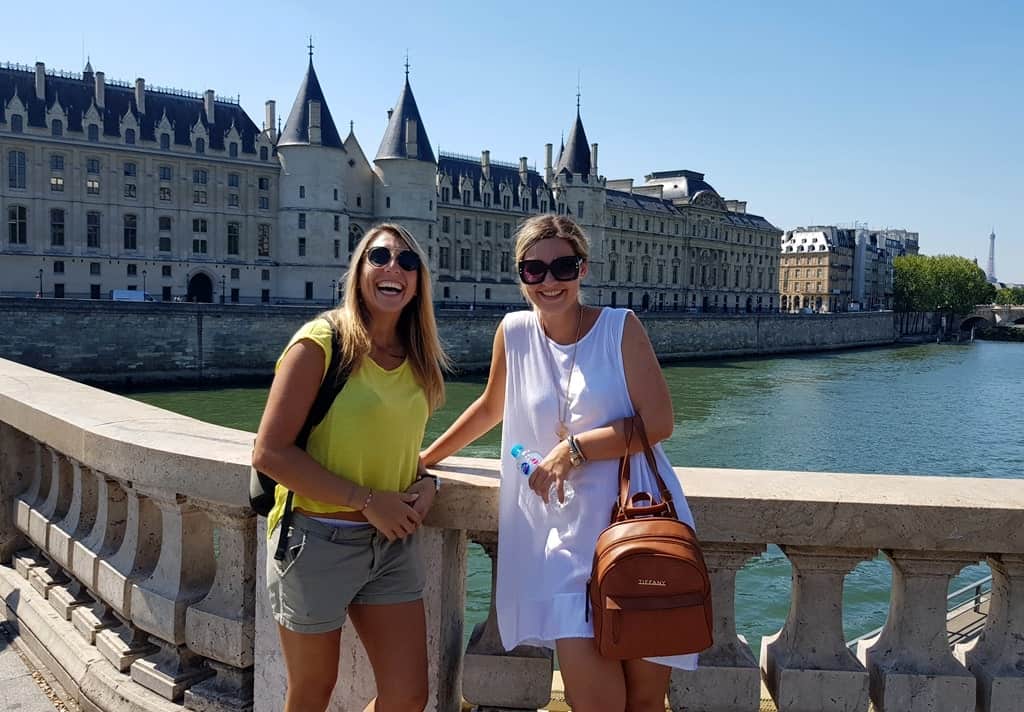 My friend and I at the Pont d'Arcole, and behind us is the Conciergerie, a medieval building that used to be a prison during the French Revolution