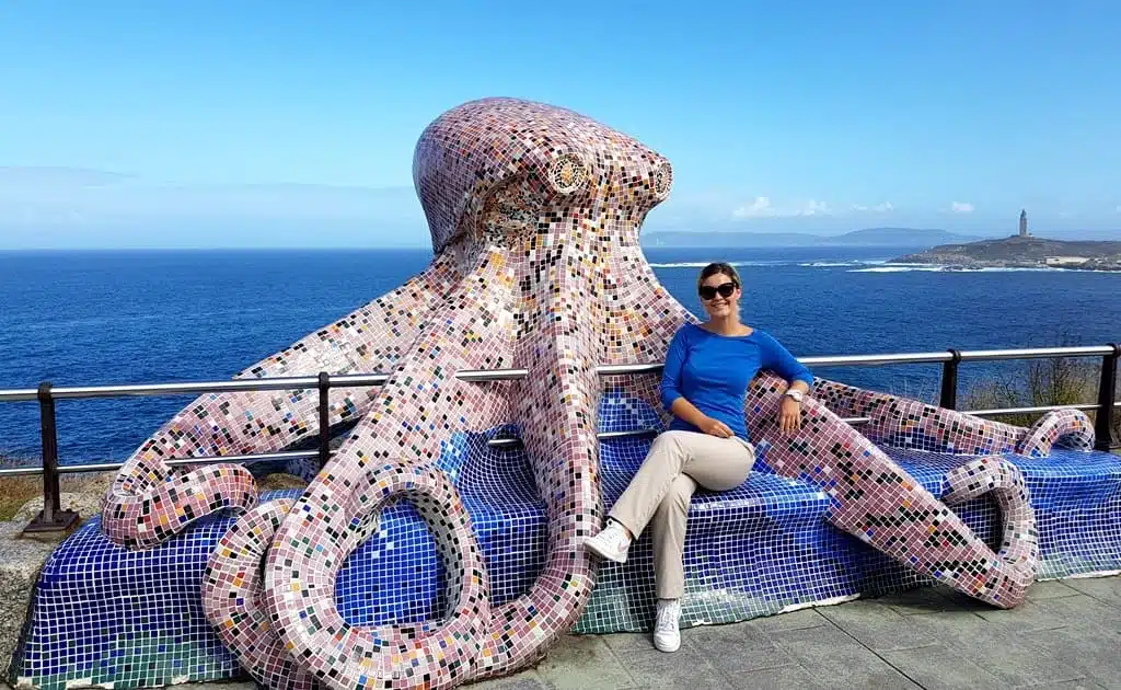 The Octopus sculpture and the Tower of Hercules in the distance, La Coruna, Spain