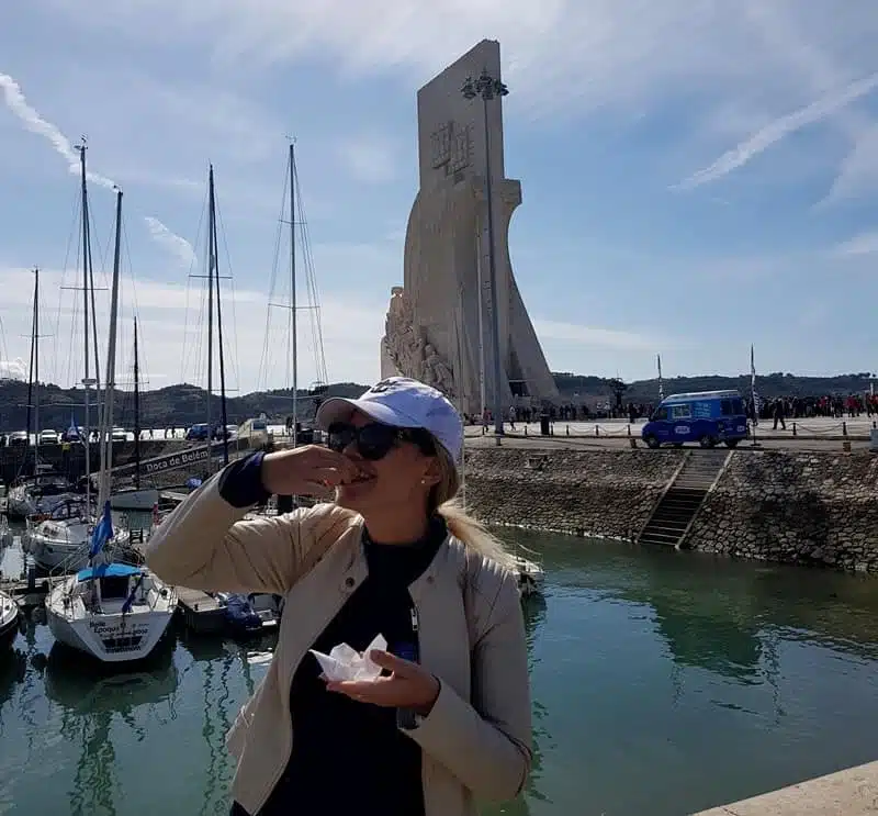 I am enjoying the original pastel de nata at the Monument of Discoveries