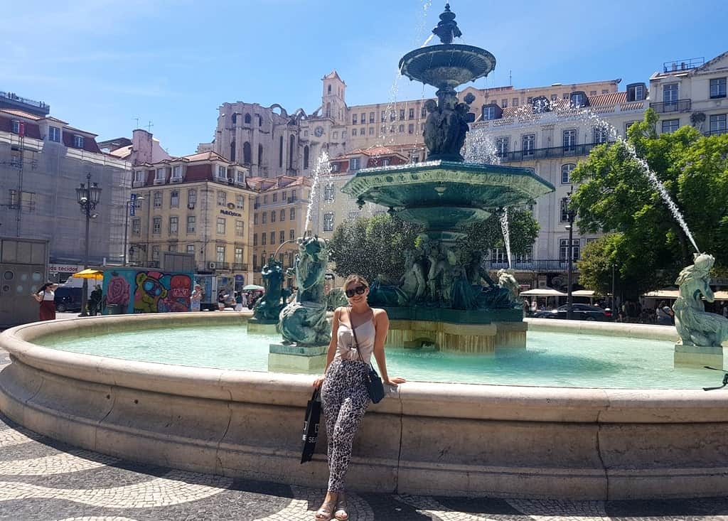 Rossio square in Lisbon is the main square in Lisbon, surrounded by restaurants, cafes, hotels, and shopping area