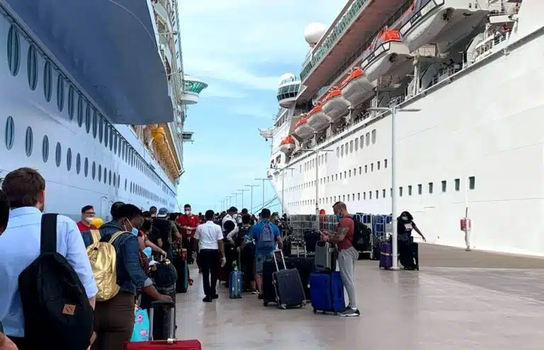 crew members in front of the ship