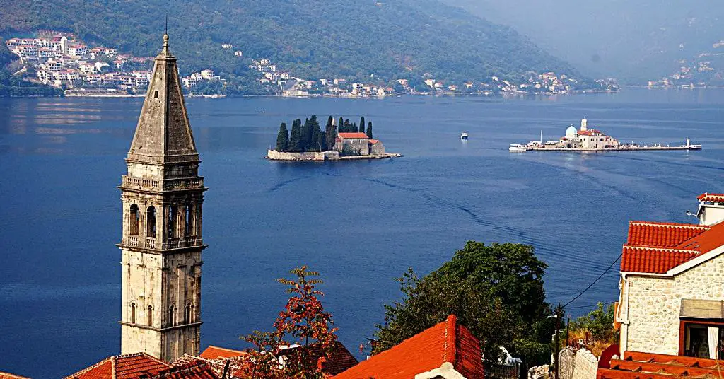 The view of Saint George island (the left one, with trees), and Our Lady of the Rocks island (on the right) from Perast