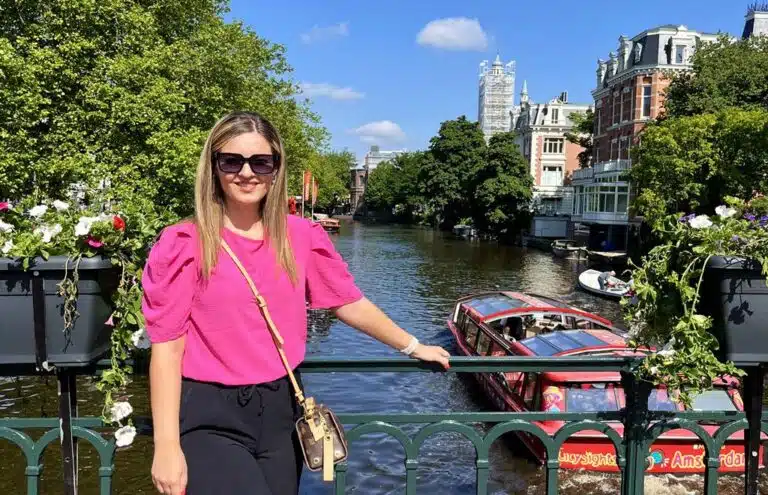 Me taking picture in front of canal in Amsterdam