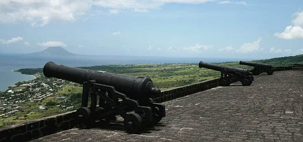 Cannons and the view of Sint Eustatius island - Brimstone Hill Fortress in St Kitts