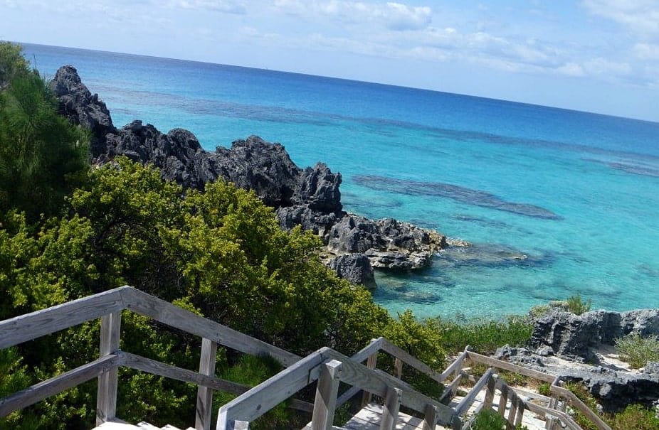 Church Bay beach wooden stairwell and rock formations - Bermuda