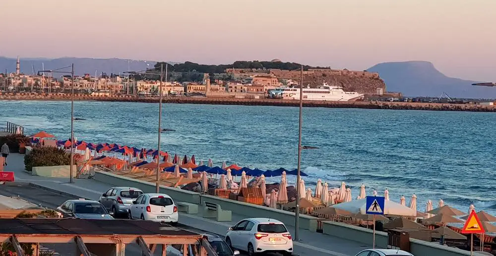 Rethymno port at sunset, with the Venerian Fortezza in the background